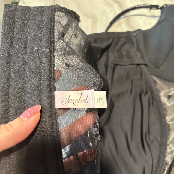 Black mesh and lace corset top with white lace trim
Size 36B - Picture 3 of 3